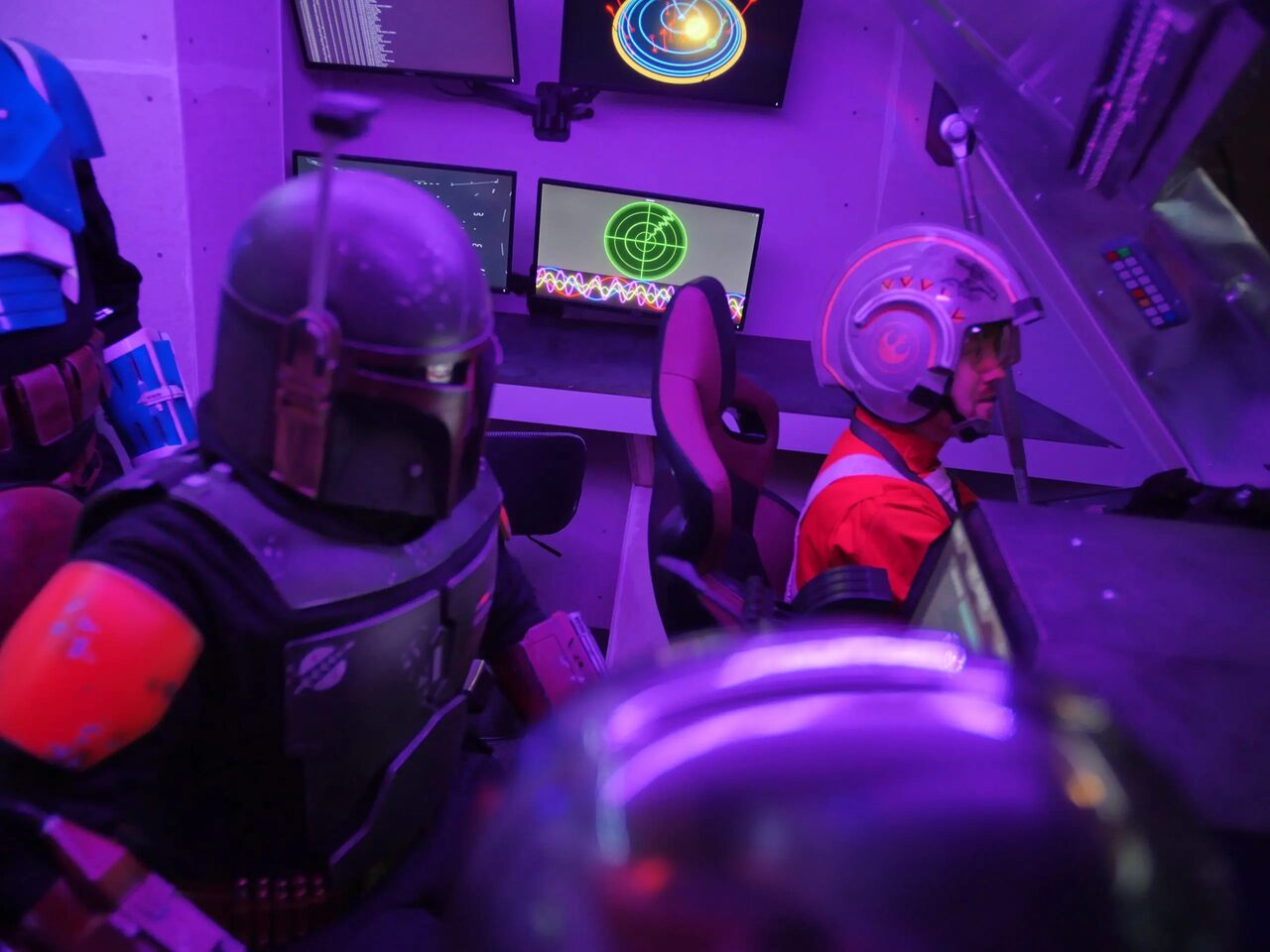 Odyssey crew stations with players and illuminated displays