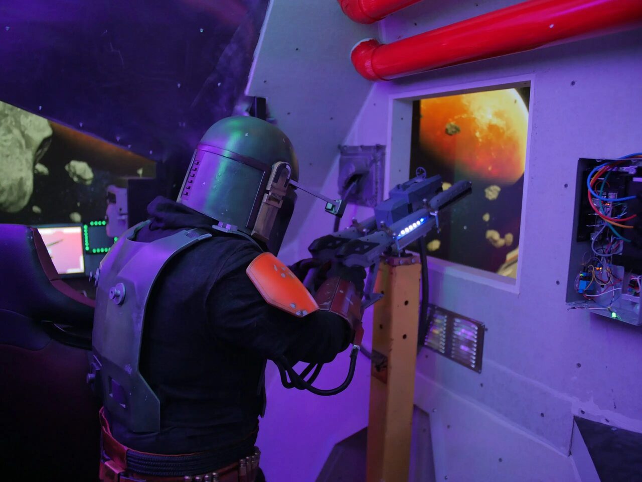 Odyssey Augmented room with suited player and physical controls
